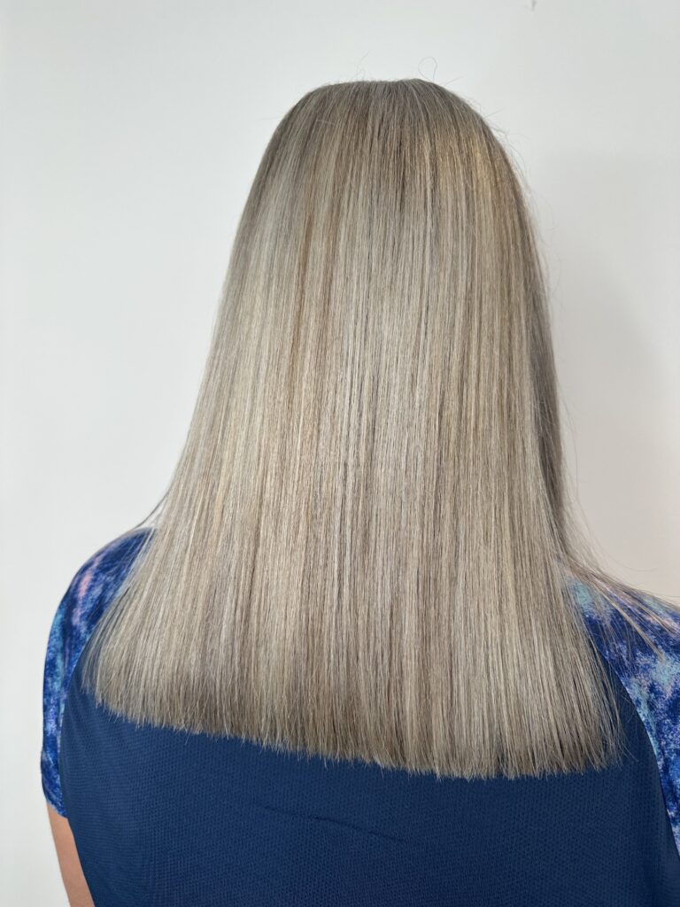 back of woman's head with grey hair