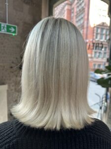 back of girls head blonde hair