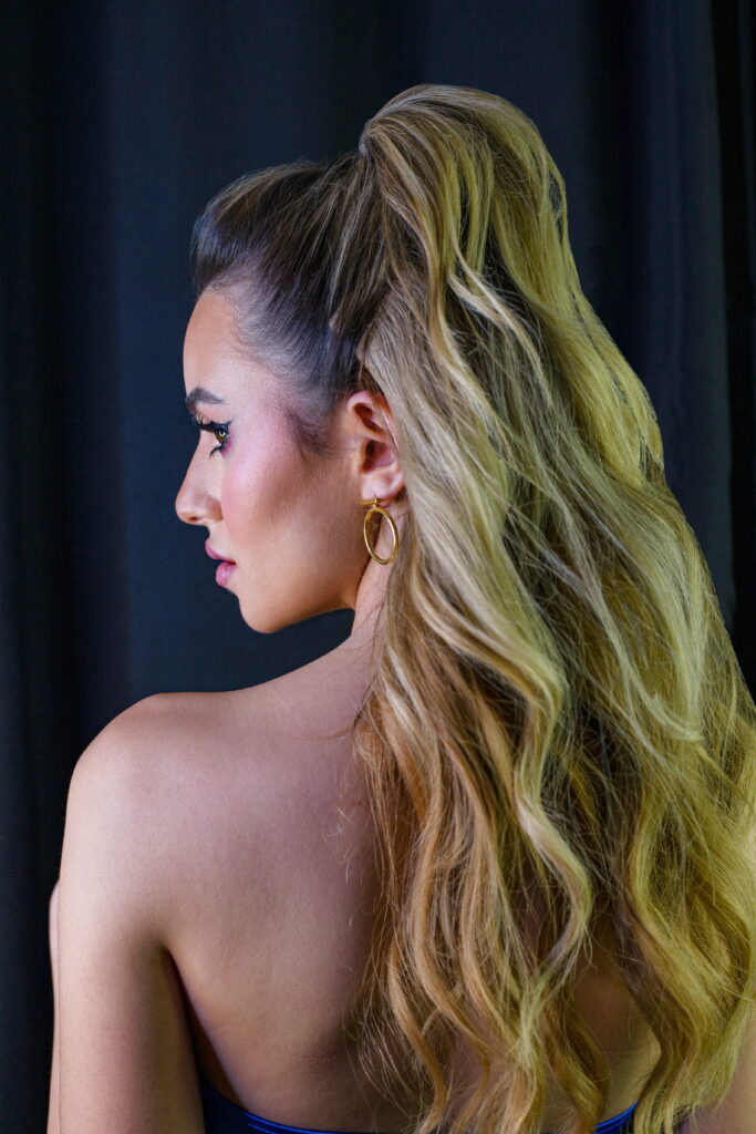 lady with half up half down hair